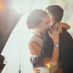 Beautiful bride and groom dancing their first dance at the wedding reception.