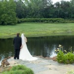 Bride and groom share a quiet moment of reflection after the wedding ceremony.