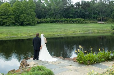 Bride and groom share a quiet moment of reflection after the wedding ceremony.
