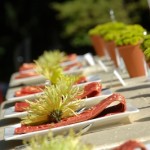 Garden-themed wedding reception place settings.